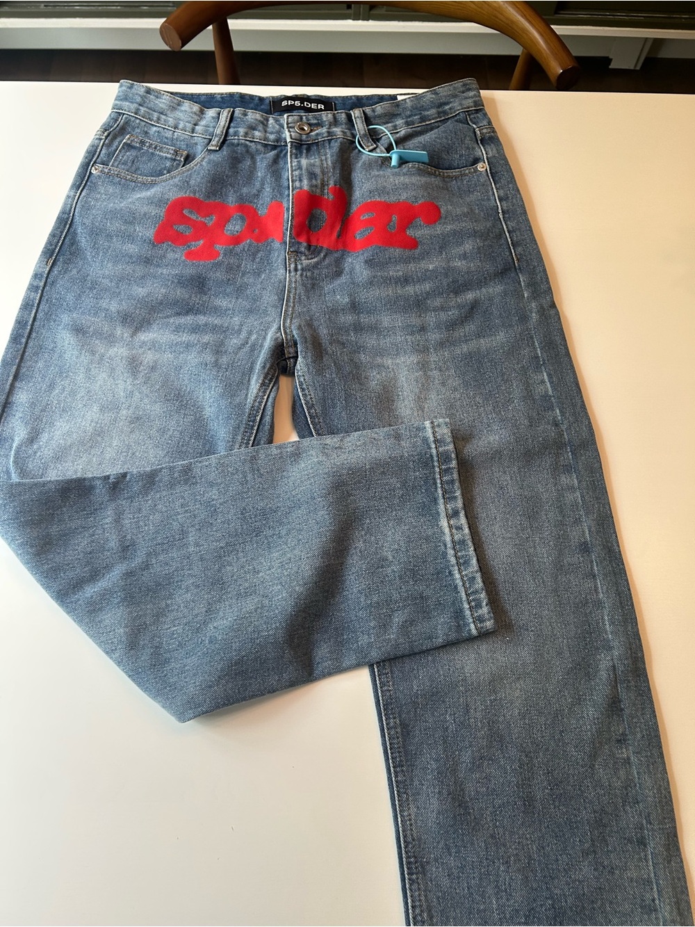 Spyder  Blue Denim Jeans with Red Script Detail